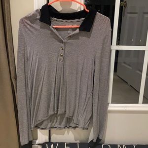 Black and white collared half button shirt